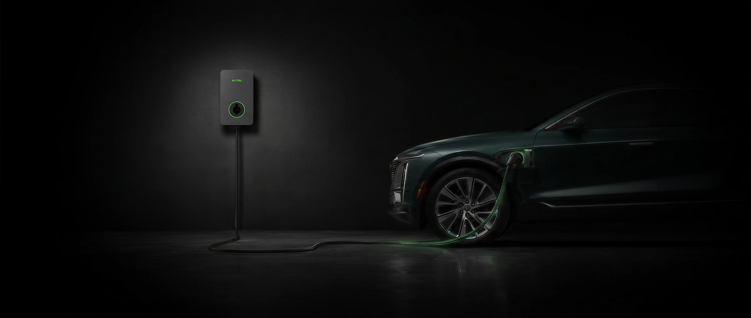 An Autel charger connected to a dark SUV, with the cable visible between charger and vehicle